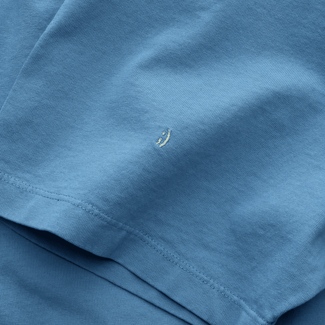 The Suspicious Smiley Tee - Mineral Blue