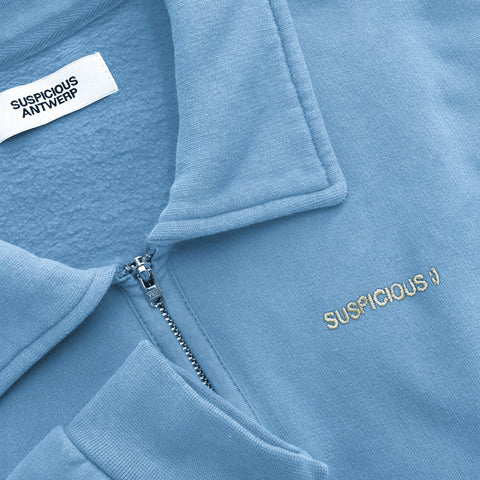 The Suspicious Smiley Half-Zip Polo - Mineral Blue